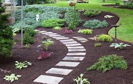 A fresh edge and mulch makes your gardens look great.